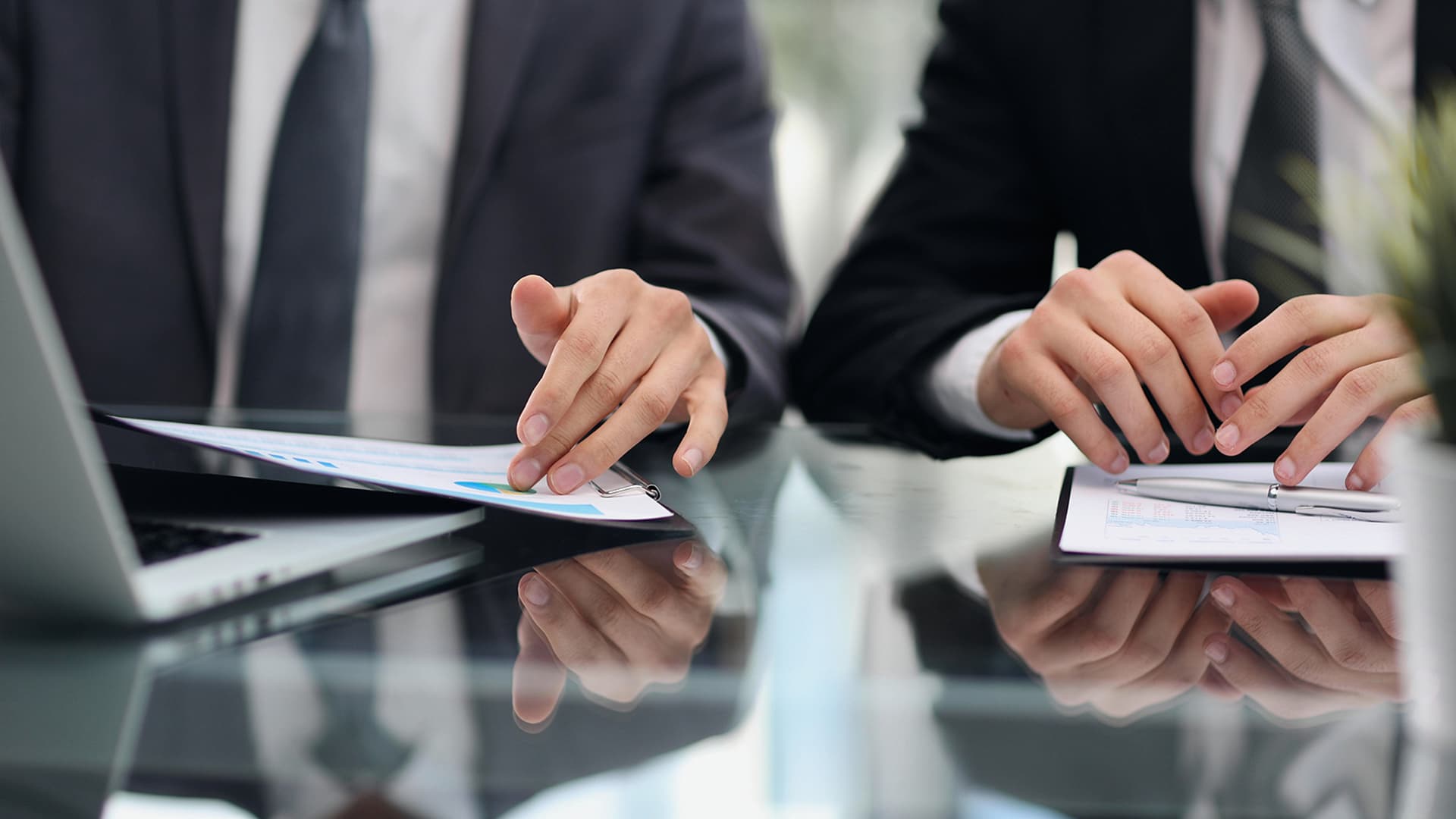 Bridge loans depicted by an office meeting