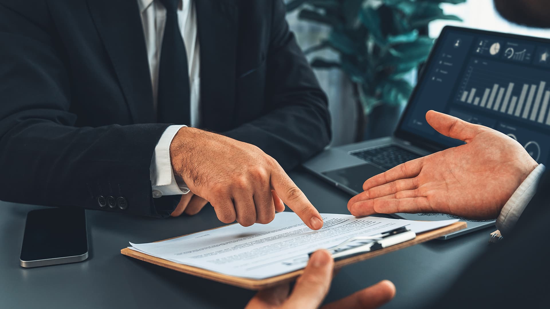 LP private equity depicted by two men going over a contract